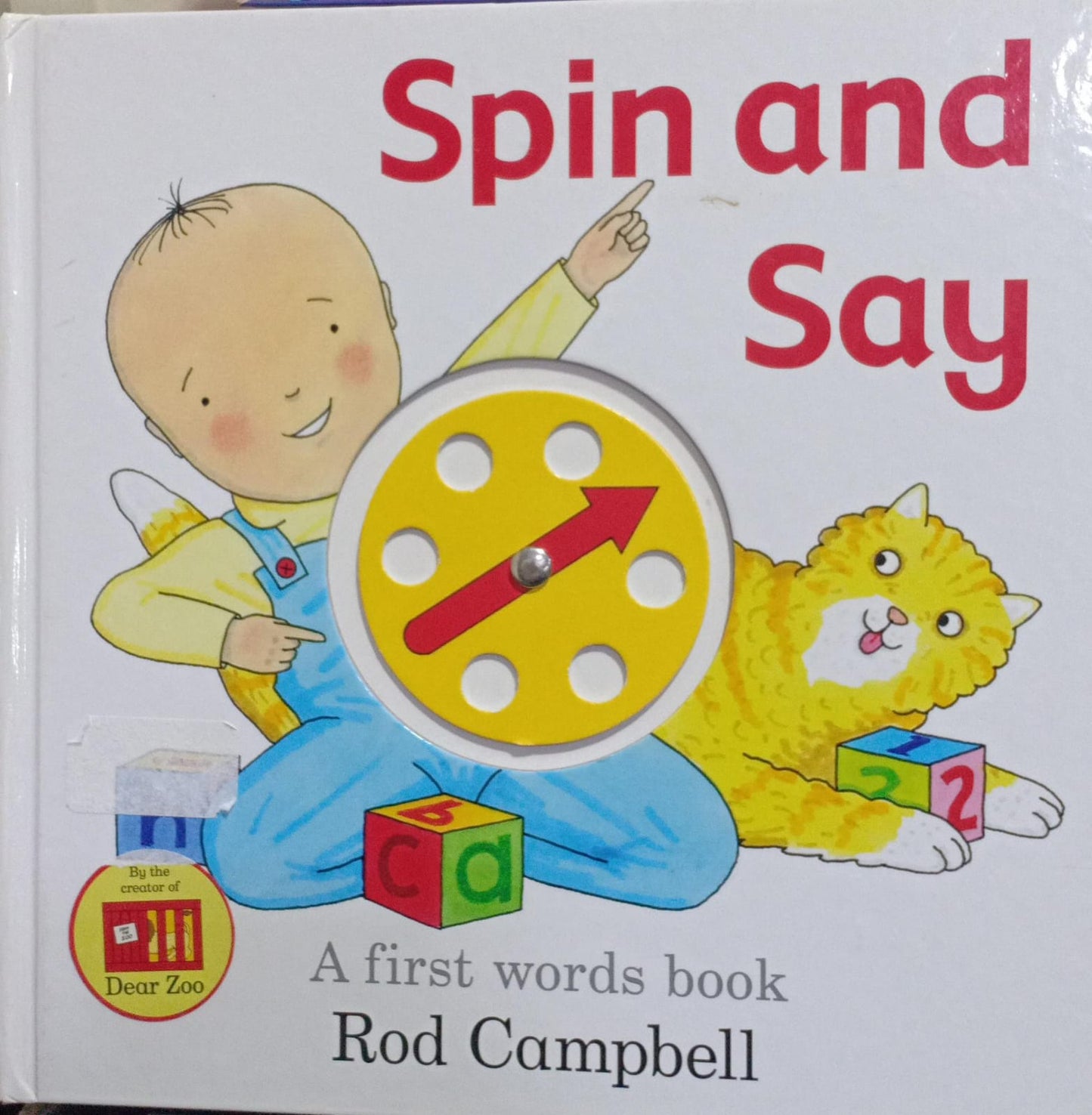 Spin and Say [board book]