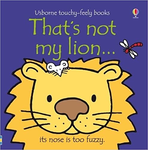 That's not my lion... [Board book] [TOUCH AND FEEL]