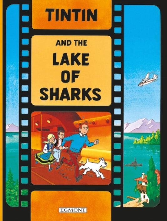 Tintin and the lake of sharks by Herge (tintin) [graphic novel]