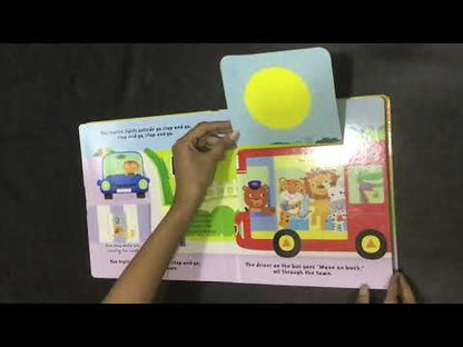 The Wheels on the Bus  (A Push-Pull-Turn-And Lift ) Board book